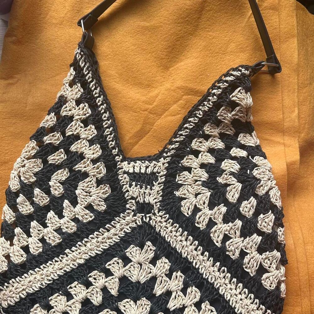 Woven black and white shoulder bag